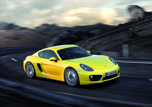 EMBARGO_28.11.12_2030hrs_The_New_Porsche_Cayman_Racing_Yellow_Action_Front__3-4.jpg